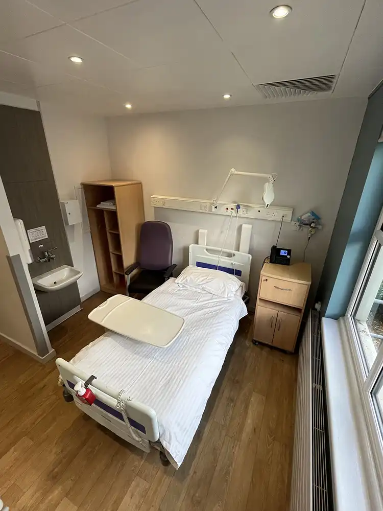 Adult Amenity Room showing wardrobe, side cupboard and sink | Parkside Suite